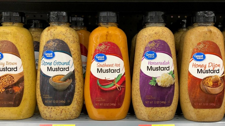 great value mustard on a grocery store shelf