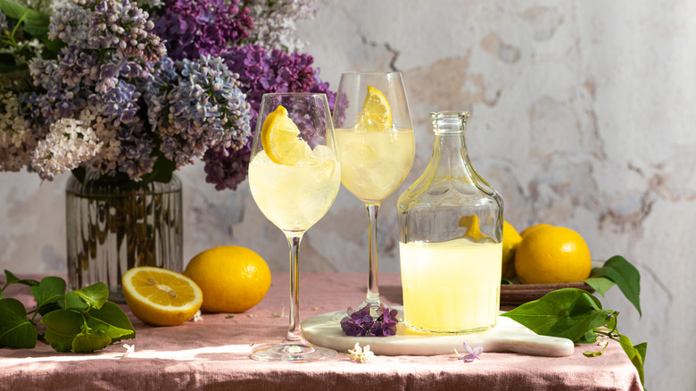 Bottle and glasses of limoncello