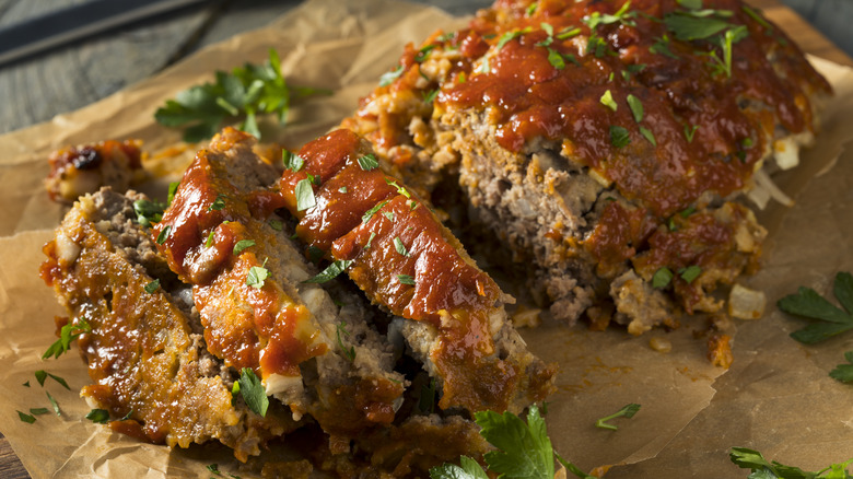 sliced meatloaf on parchment paper