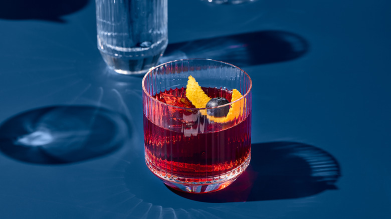 Negroni on blue surface 