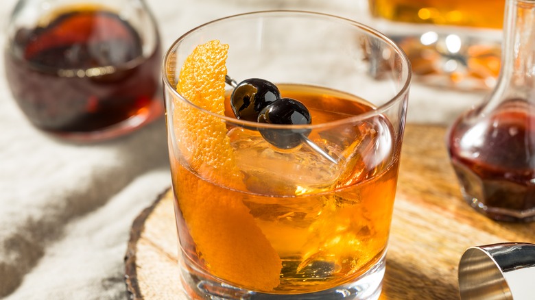 old fashioned with cherries and zest