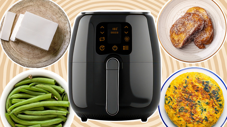 Air fryer surrounded by various foods