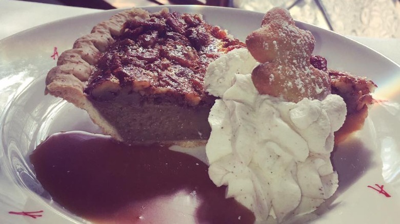 Arnaud's pecan pie on plate