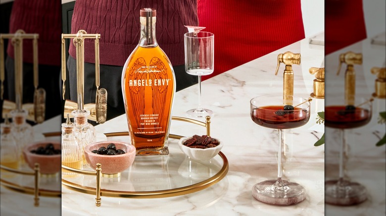 Bottle of Angel's Envy with a cocktail