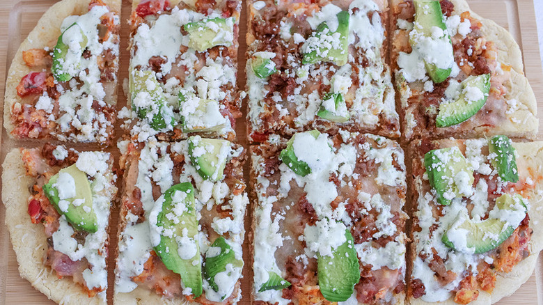 Mexican breakfast pizza with cotija cheese and avocado