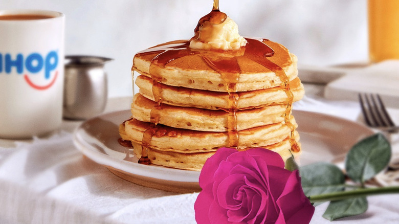 IHOP pancakes with butter, syrup, rose, and cup of coffee