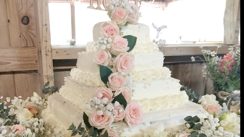 decorated tiered wedding cake made with Costco cakes