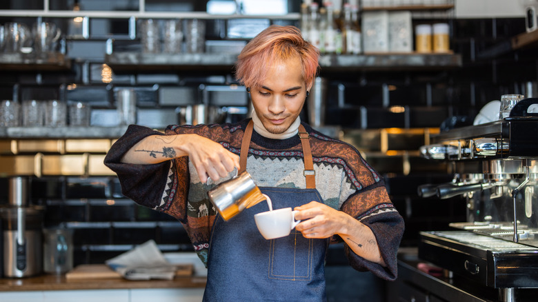 Barista crafting a drink