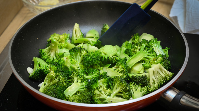 broccoli sauteed in a pan