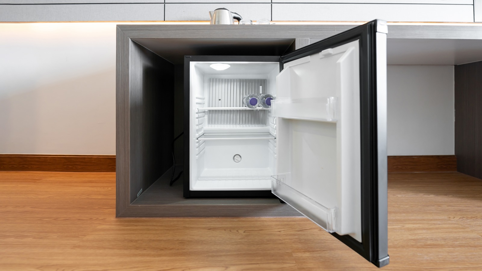 HOTELS ARE NOW CHARGING $50 TO PUT YOUR OWN STUFF IN THE MINI FRIDGE