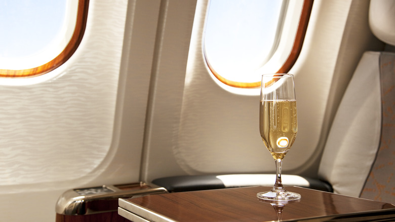 A glass of Champagne on plane 