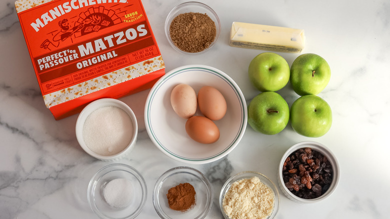 Apple matzo kugel ingredients on a table