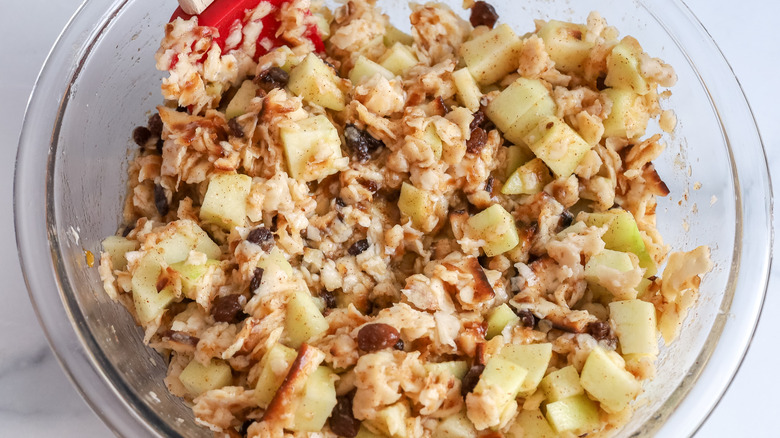Apple matzo kugel ingredients mixed in a bowl