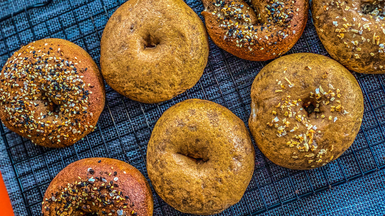 Homemade bagels on a rack
