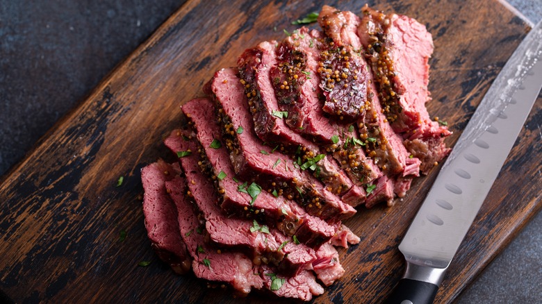 corned beef on a wood board