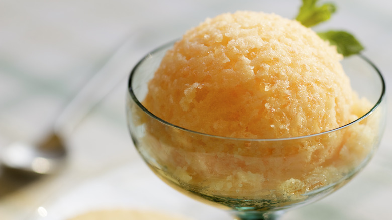 Peach sorbet in glass cup