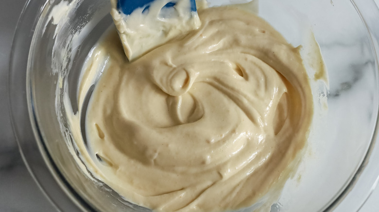 truffle aioli being mixed together in a bowl