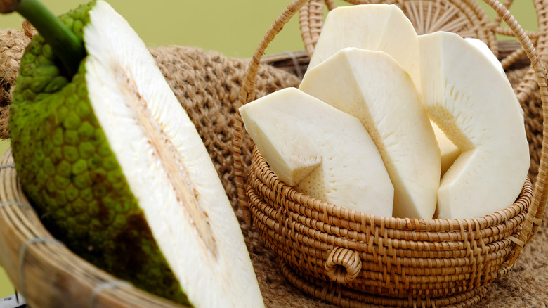 breadfruit cut and whole in basket