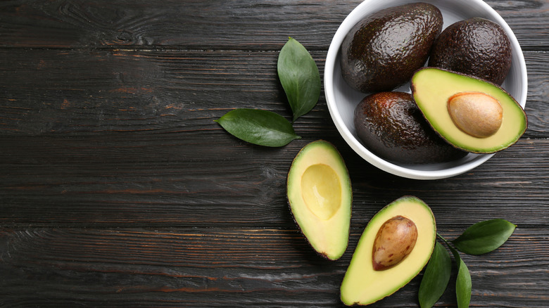 Bowl of avocados.