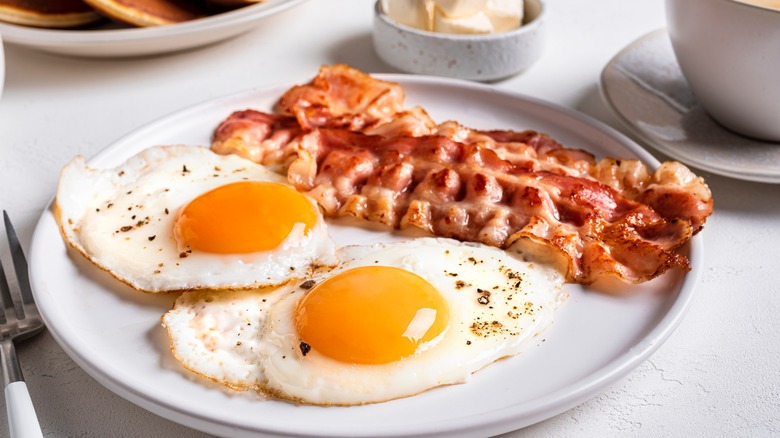 plate of bacon and eggs