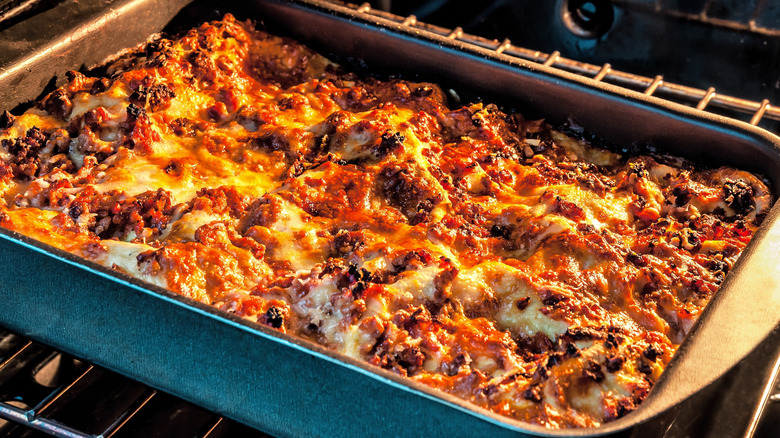 Lasagna cooking in the oven