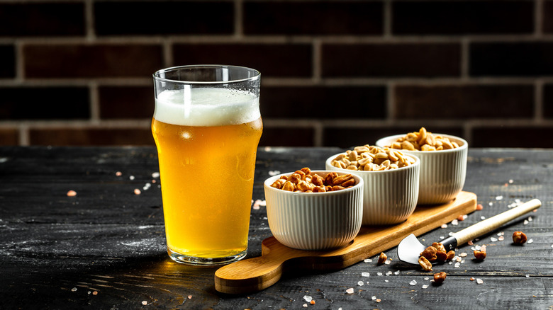 Bowls of nuts and beer