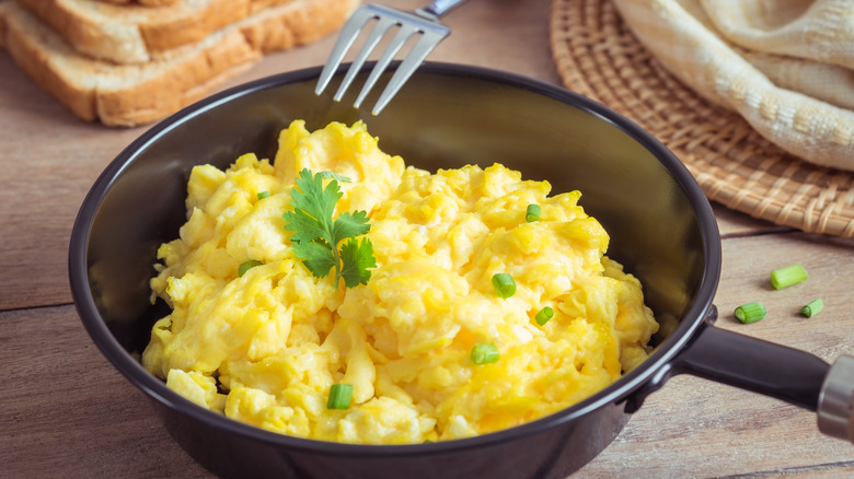 creamy scrambled eggs in bowl