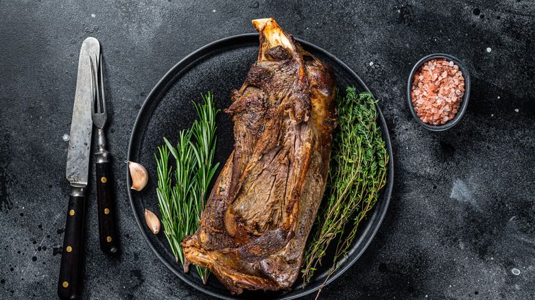 Cooked lamb shoulder on plate 