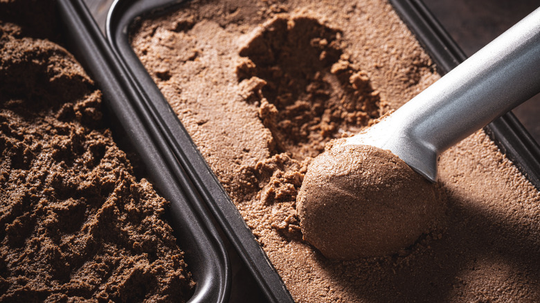 Chocolate ice cream being scooped