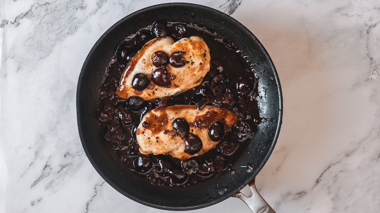 cherry balsamic chicken in pan