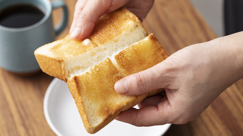 Slice of Ginza Nishikawa milk bread being torn