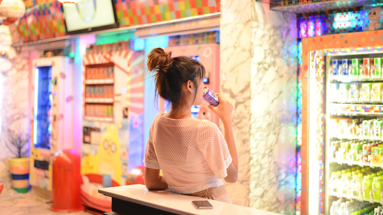 Woman at Japanese vending machines