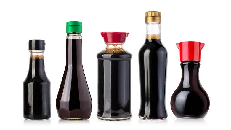 soy sauce bottles against white background