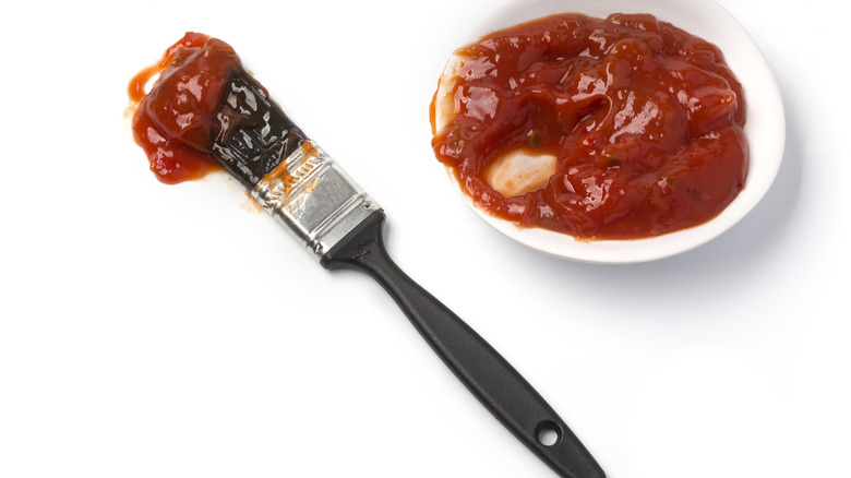 sticky barbecue sauce on a brush
