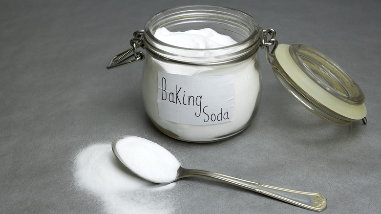 baking soda against grey background