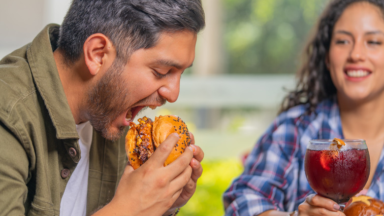 Person taking bite