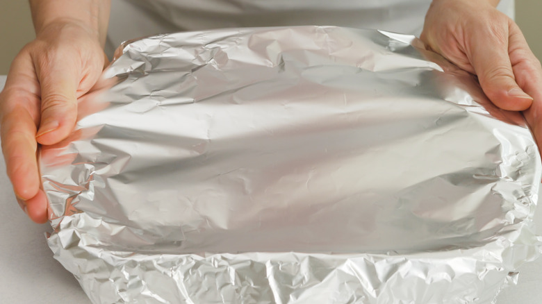 tin foil over baking dish