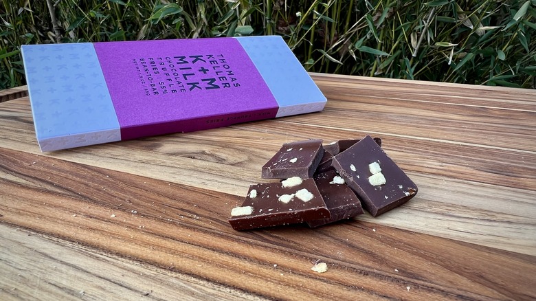 Chocolate squares on wooden board