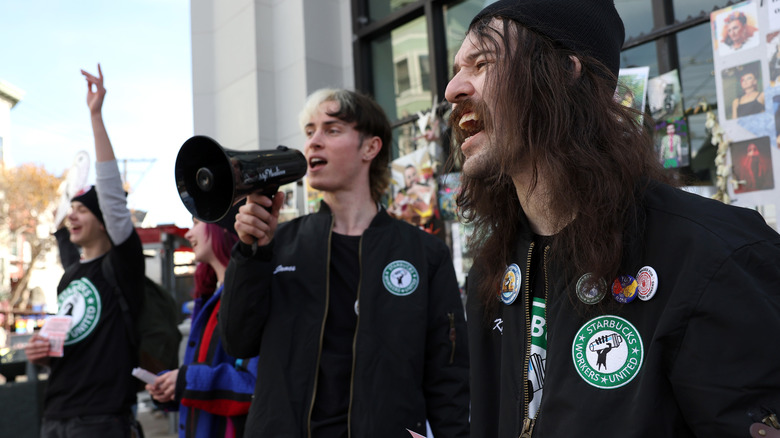 Starbucks employees protesting Red Cup Day