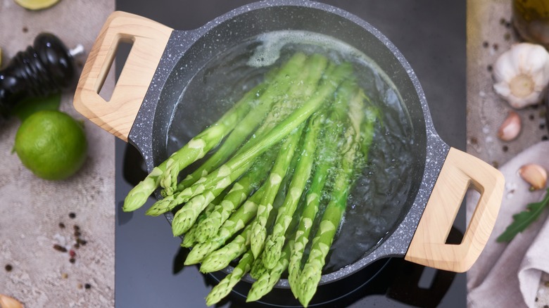 Asparagus cooking in water