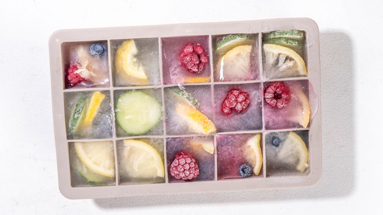 Frozen fruit in ice cube trays