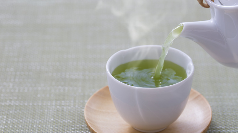 green tea in white mug