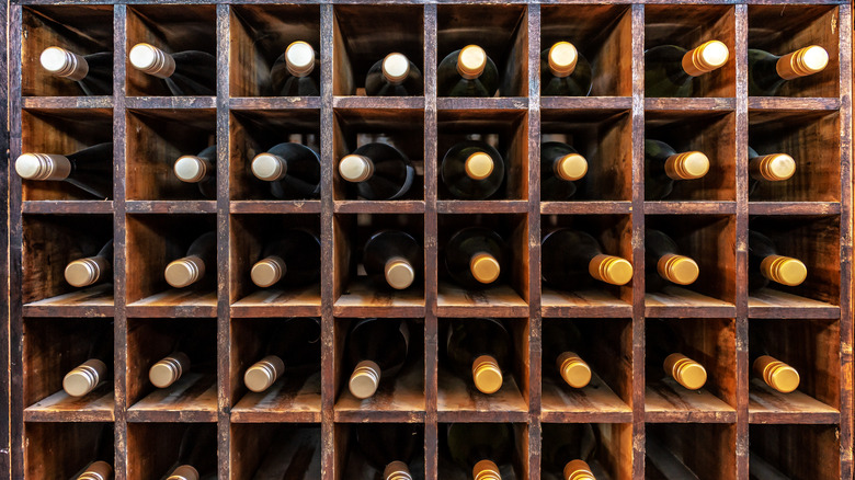 horizontal wine bottles in rack