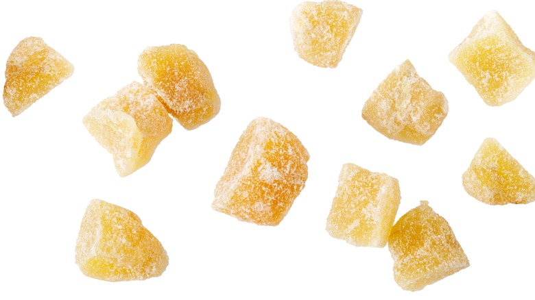 Candied ginger on white background