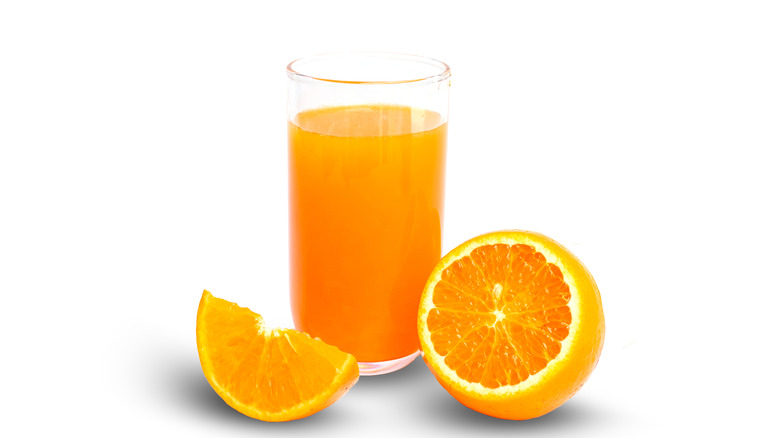 Orange juice on white background