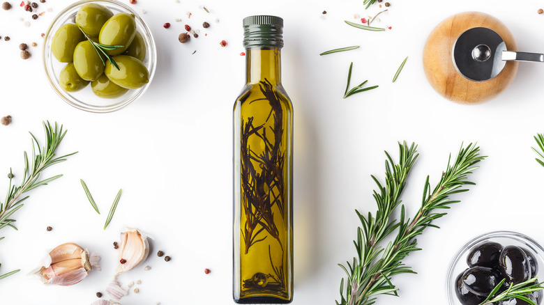 olives and rosemary olive oil in bottle