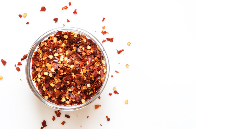 red pepper flakes in white bowl