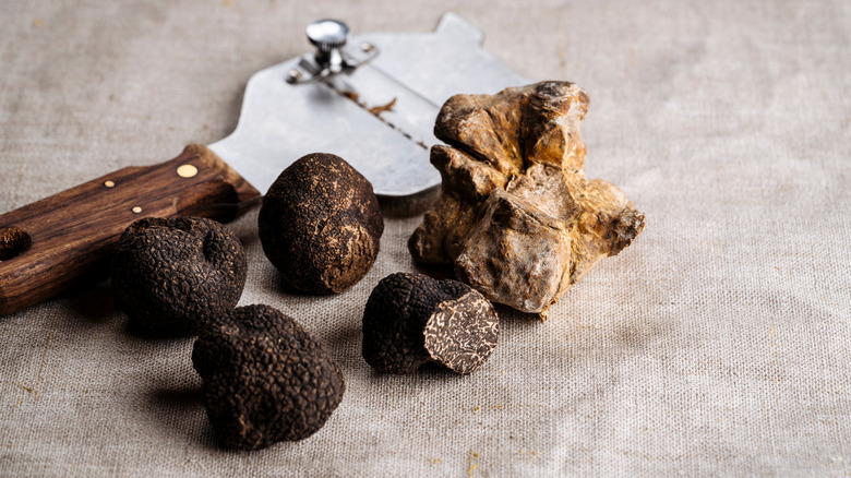 truffles and a shaver on beige background