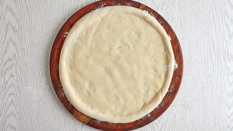 Stretched pizza dough