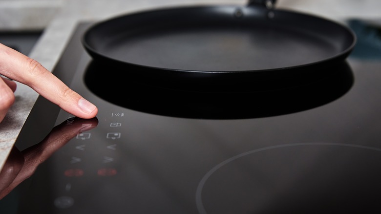 Setting temperature on induction stove